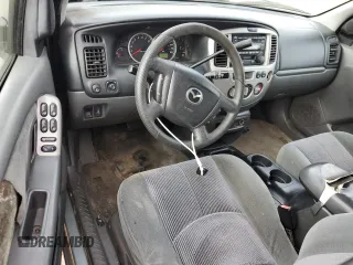 2003 Mazda Tribute LX with VIN 4F2YZ94123KM49852, listed as a Copart auction lot 71779054 with 263,938 mi miles and Salvage Title. Bid and sale history available at carsss.com. Image 8.