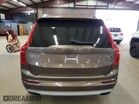 2017 Volvo XC90 Momentum z VIN YV4A22PK9H1115068, wystawiony jako Copart lot #54205205 z przebiegiem 130 082 mil mil oraz Czysty tytuł • Clean title. Historia ofert i sprzedaży dostępna na DreamBid. Obrazek 6.