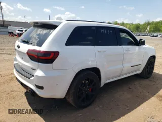 2018 Jeep Grand Cherokee with VIN NJ1449E, listed as a Copart auction lot 51357834 with 32,619 mi miles and Salvage title. Bid and sale history available at DreamBid. Image 3.
