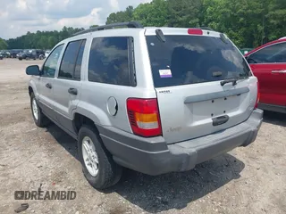 2004 Jeep Grand Cherokee Laredo with VIN 1J4GX48N04C435603, listed as a IAAI auction lot 42274197 with 256,163 mi miles and . Bid and sale history available at DreamBid. Image 3.