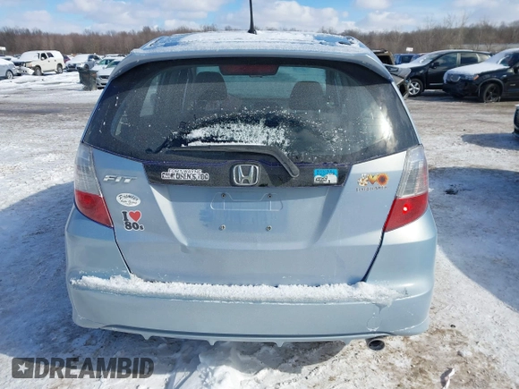 2009 Honda Fit Sport with VIN JHMGE884X9S026613, listed as a IAAI auction lot 41593112 with 144,736 mi miles. Bid and sale history available at carsss.com. Image 16.