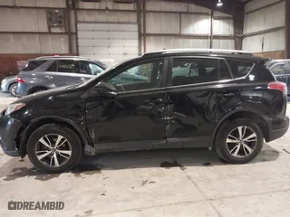 2017 Toyota RAV4 XLE with VIN 2T3RFREV0HW669312, listed as a IAAI auction lot 41410721 with 99,404 mi miles. Bid and sale history available at carsss.com. Image 14.