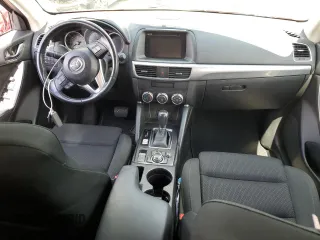 2016 Mazda CX-5 Touring with VIN JM3KE2CY0G0627886, listed as a Copart auction lot 55207054 with 95,884 mi miles and Salvage Title. Bid and sale history available at carsss.com. Image 8.