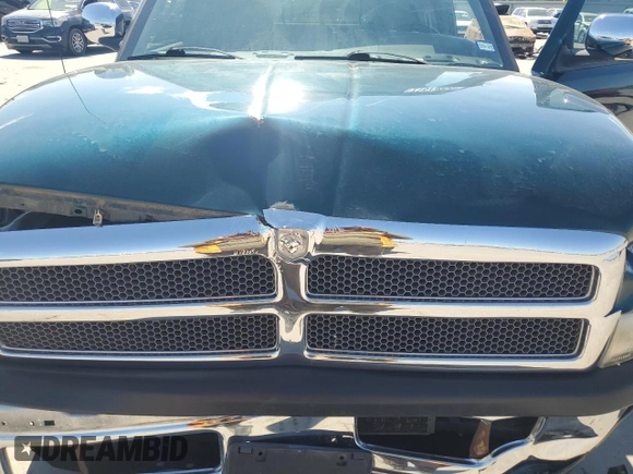 1999 Dodge 1500 with VIN 3B7HC12YXXG224417, listed as a Copart auction lot 71873954 with 139,596 mi miles and Salvage Title. Bid and sale history available at DreamBid. Image 12.