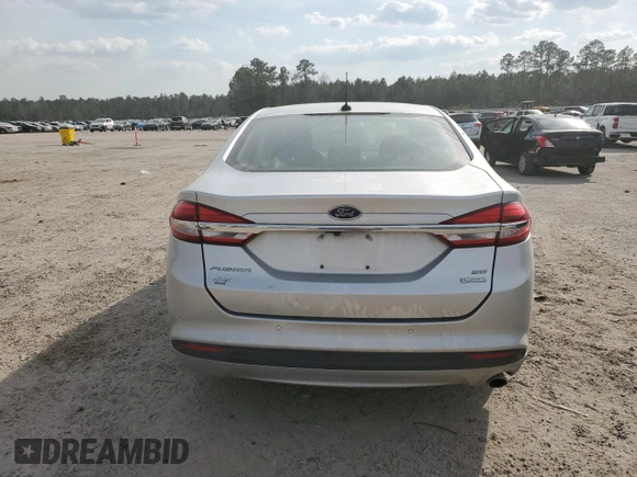 2018 Ford Fusion SE z VIN 3FA6P0HD2JR222530, wystawiony jako Copart lot #48528955 z przebiegiem 90 665 mil mil oraz Szkoda całkowita • Salvage title. Historia ofert i sprzedaży dostępna na DreamBid. Obrazek 6.