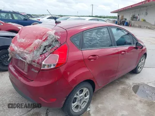 2016 Ford Fiesta SE with VIN 3FADP4EJ4GM149563, listed as a IAAI auction lot 41917375 with 134,994 mi miles. Bid and sale history available at carsss.com. Image 4.