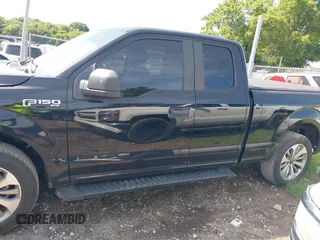 2018 Ford F-150 XL with VIN 1FTEX1CPXJKE63642, listed as a IAAI auction lot 42768090 with 147,219 mi miles and . Bid and sale history available at DreamBid. Image 14.