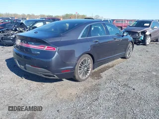 2014 Lincoln MKZ z VIN 3LN6L2J97ER835137, wystawiony jako IAAI lot #42062405 z przebiegiem 281 924 mil mil oraz . Historia ofert i sprzedaży dostępna na DreamBid. Obrazek 4.