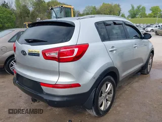 2011 Kia Sportage LX with VIN KNDPB3A23B7053943, listed as a IAAI auction lot 42063941 with 234,364 mi miles and . Bid and sale history available at carsss.com. Image 4.