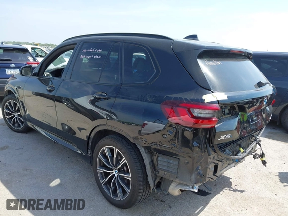 2021 BMW X5 xDrive40i with VIN 5UXCR6C01M9E66976, listed as a IAAI auction lot 42024110 with 67,877 mi miles and . Bid and sale history available at DreamBid. Image 3.
