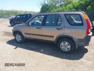 2004 Honda CR-V LX with VIN JHLRD68444C015503, listed as a IAAI auction lot 42145422 with 189,975 mi miles and . Bid and sale history available at carsss.com. Image 3.