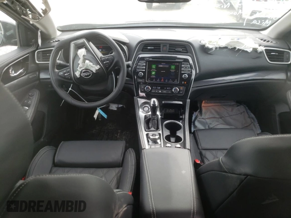2023 Nissan Maxima Platinum with VIN 1N4AA6FV0PC501797, listed as a Copart auction lot 65560742 with 89 mi miles and Salvage title. Bid and sale history available at DreamBid. Image 8.