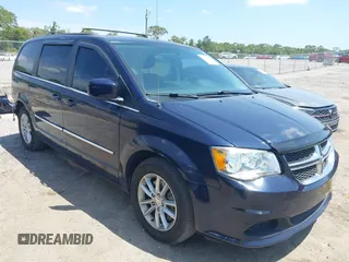 2014 Dodge Grand Caravan SXT with VIN 2C4RDGCG3ER266199, listed as a IAAI auction lot 42119064 with 148,067 mi miles and . Bid and sale history available at DreamBid. Image 1.