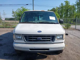 1999 Ford Econoline Cargo with VIN 1FTRE1420XHA34056, listed as a IAAI auction lot 41998411 with 236,267 mi miles. Bid and sale history available at carsss.com. Image 12.