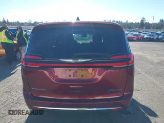 2023 Chrysler Pacifica Hybrid Limited with VIN 2C4RC1S7XPR518695, listed as a IAAI auction lot 41301401 with 24,433 mi miles and . Bid and sale history available at DreamBid. Image 16.