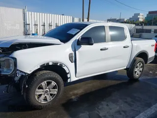 2024 Ford Ranger XL with VIN 1FTER4PH9RLE10340, listed as a IAAI auction lot 41591734 with 8,610 mi miles. Bid and sale history available at carsss.com. Image 2.