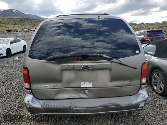 2000 Ford Windstar SE с VIN 2FMZA5249YBC34841, выставлен на аукционе Copart как лот 72383304 с пробегом Не указан миль и Списание • Salvage title. История ставок и продаж доступна на DreamBid. Изображение 6.