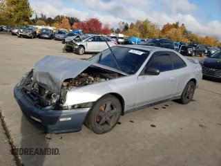 2001 Honda Prelude with VIN JHMBB624X1C001225, listed as a Copart auction lot 79251164 with 234,821 mi miles and Salvage Title. Bid and sale history available at DreamBid. Image 1.