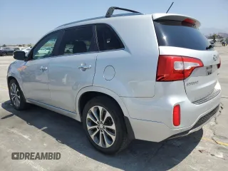 2014 Kia Sorento SX z VIN 5XYKW4A74EG547803, wystawiony jako Copart lot #58390675 z przebiegiem 138 424 mil mil oraz Szkoda całkowita • Salvage title. Historia ofert i sprzedaży dostępna na DreamBid. Obrazek 2.