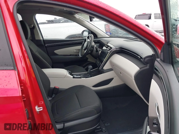 2022 Hyundai Tucson SEL with VIN 5NMJF3AE2NH115088, listed as a IAAI auction lot 41915800 with 13,120 mi miles and . Bid and sale history available at DreamBid. Image 5.