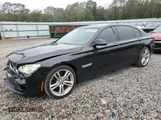 2013 BMW 7 Series 750Li with VIN WBAYE8C53DD131817, listed as a Copart auction lot 79615564 with 125,737 mi miles and Salvage title. Bid and sale history available at DreamBid. Image 1.