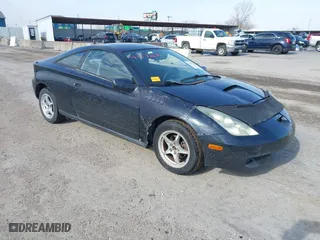 2000 Toyota Celica GT with VIN JTDDR32T1Y0053060, listed as a IAAI auction lot 41572670 with 258,437 mi miles. Bid and sale history available at carsss.com. Image 1.