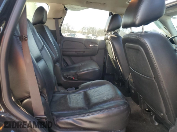 2013 Chevrolet Tahoe LTZ with VIN 1GNSCCE04DR162474, listed as a Copart auction lot 49386335 with 331,358 mi miles and Salvage title. Bid and sale history available at DreamBid. Image 12.