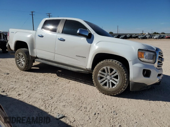 2017 GMC Canyon 4WD SLT with VIN 1GTP6DE18H1301885, listed as a Copart auction lot 77217864 with 119,413 mi miles and Salvage Title. Bid and sale history available at carsss.com. Image 4.