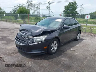 2014 Chevrolet Cruze 1LT z VIN 1G1PC5SBXE7178264, wystawiony jako IAAI lot #42387875 z przebiegiem 125 437 mil mil oraz . Historia ofert i sprzedaży dostępna na DreamBid. Obrazek 2.