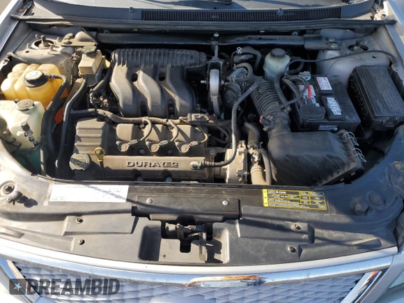 2005 Ford Five Hundred Limited z VIN 1FAHP28185G111858, wystawiony jako Copart lot #51687615 z przebiegiem 83 788 mil mil oraz Szkoda całkowita • Salvage title. Historia ofert i sprzedaży dostępna na DreamBid. Obrazek 13.