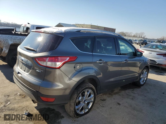 2014 Ford Escape Titanium with VIN 1FMCU9J90EUE48236, listed as a Copart auction lot 85134724 with 64,162 mi miles and Salvage Title. Bid and sale history available at carsss.com. Image 3.