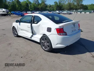 2011 Scion tC z VIN JTKJF5C73B3013201, wystawiony jako IAAI lot #42137431 z przebiegiem 157 352 mil mil oraz . Historia ofert i sprzedaży dostępna na DreamBid. Obrazek 3.