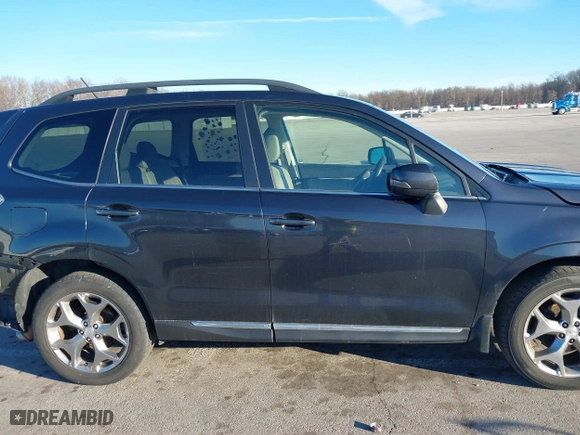 2015 Subaru Forester 2.5i Touring with VIN JF2SJAUC2FH827235, listed as a IAAI auction lot 41692229 with 182,123 mi miles. Bid and sale history available at carsss.com. Image 14.