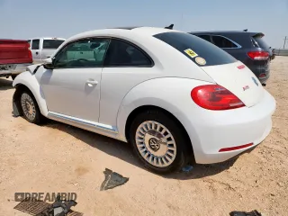 2013 Volkswagen Beetle 2.5L с VIN 3VWJX7AT3DM660437, выставлен на аукционе Copart как лот 61713555 с пробегом Не указан миль и Списание • Salvage title. История ставок и продаж доступна на DreamBid. Изображение 2.
