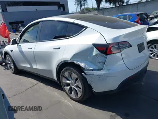 2021 Tesla Model Y Long Range with VIN 5YJYGDEE3MF081304, listed as a IAAI auction lot 41706240 with 90,510 mi miles and . Bid and sale history available at DreamBid. Image 3.