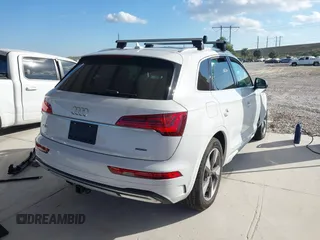 2023 Audi Q5 Premium Plus z VIN WA1BBAFY7P2024214, wystawiony jako IAAI lot #41169876 z przebiegiem 21 183 mil mil oraz . Historia ofert i sprzedaży dostępna na DreamBid. Obrazek 4.