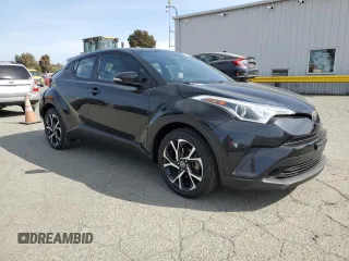 2018 Toyota C-HR XLE z VIN NMTKHMBXXJR024077, wystawiony jako Copart lot #53398025 z przebiegiem 97 079 mil mil oraz Szkoda całkowita • Salvage title. Historia ofert i sprzedaży dostępna na DreamBid. Obrazek 4.