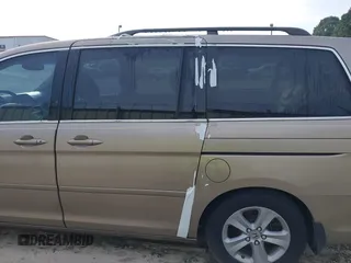 2010 Honda Odyssey Touring with VIN 5FNRL3H9XAB094779, listed as a IAAI auction lot 40412812 with 145,533 mi miles. Bid and sale history available at carsss.com. Image 6.