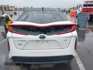 2021 Toyota Prius LE with VIN JTDKAMFP0M3169019, listed as a IAAI auction lot 41481098 with 84,304 mi miles and . Bid and sale history available at DreamBid. Image 16.