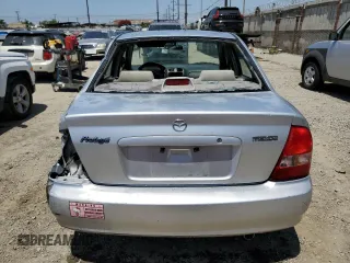 2002 Mazda Protege DX z VIN JM1BJ225920543960, wystawiony jako Copart lot #56336555 z przebiegiem 173 874 mil mil oraz Szkoda całkowita • Salvage title. Historia ofert i sprzedaży dostępna na DreamBid. Obrazek 6.
