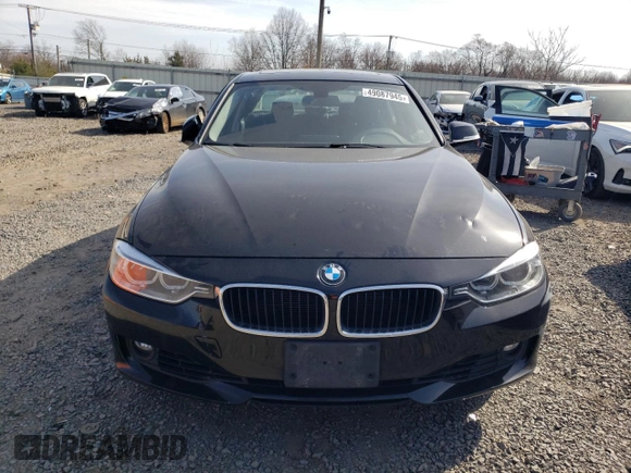2013 BMW 3 Series 335i xDrive with VIN WBA3B9G58DNR89894, listed as a Copart auction lot 49087945 with 70,141 mi miles and Salvage title. Bid and sale history available at DreamBid. Image 5.