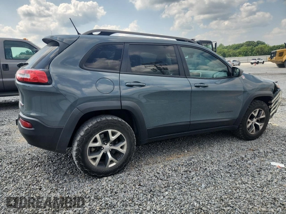 2014 Jeep Cherokee Trailhawk с VIN 1C4PJMBS1EW212024, выставлен на аукционе Copart как лот 58825265 с пробегом 99 087 миль миль и Списание • Salvage title. История ставок и продаж доступна на DreamBid. Изображение 3.