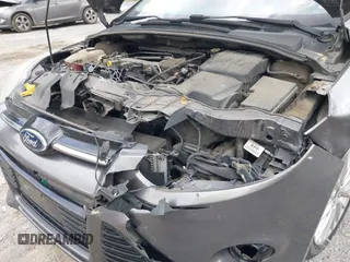 2013 Ford Focus Titanium with VIN 1FADP3J28DL225887, listed as a IAAI auction lot 42122968 with 139,248 mi miles and . Bid and sale history available at carsss.com. Image 6.
