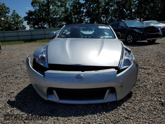 2012 Nissan 370Z Touring with VIN JN1AZ4FH3CM370910, listed as a Copart auction lot 65940005 with 23,009 mi miles and Salvage title. Bid and sale history available at DreamBid. Image 5.