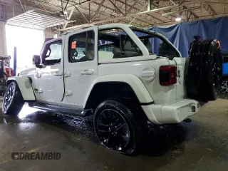 2021 Jeep Wrangler Unlimited Sahara High Altitude with VIN 1C4HJXEN7MW651514, listed as a Copart auction lot 83654114 with Not provided miles and Salvage title. Bid and sale history available at DreamBid. Image 2.