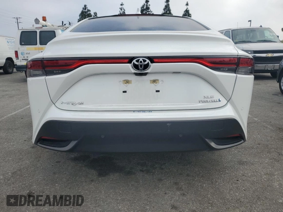 2023 Toyota Mirai XLE with VIN JTDAAAAA8PA009516, listed as a Copart auction lot 62543395 with 27,867 mi miles and Salvage title. Bid and sale history available at DreamBid. Image 6.