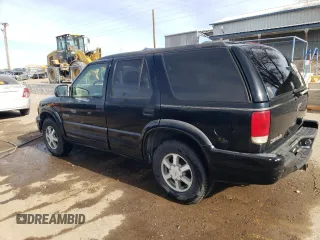 2000 Oldsmobile Bravada z VIN 1GHDT13W3Y2178106, wystawiony jako Copart lot #85069954 z przebiegiem 211 164 mil mil oraz Szkody całkowita. Historia ofert i sprzedaży dostępna na DreamBid. Obrazek 2.
