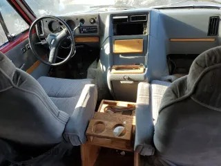 1989 Chevrolet Chevy Van z VIN 1GBEG25K1K7188534, wystawiony jako Copart lot #65769724 z przebiegiem 72 888 mil mil oraz Nie do naprawy. Historia ofert i sprzedaży dostępna na DreamBid. Obrazek 8.