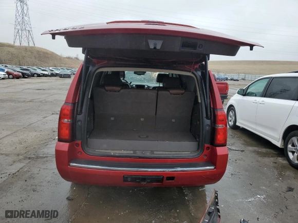 2015 Chevrolet Tahoe LTZ with VIN 1GNSKCKC8FR133323, listed as a Copart auction lot 47989525 with 123,391 mi miles and Salvage Title. Bid and sale history available at carsss.com. Image 6.