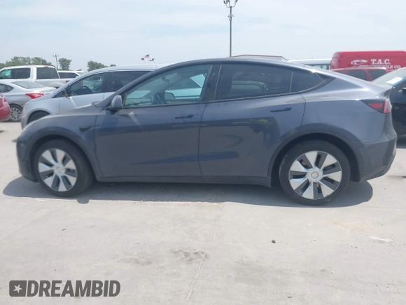2023 Tesla Model Y Long Range z VIN 7SAYGDEE6PA169168, wystawiony jako IAAI lot #42050428 z przebiegiem 26 731 mil mil oraz . Historia ofert i sprzedaży dostępna na DreamBid. Obrazek 14.